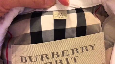 how to spot a fake burberry trench coat|genuine burberry label.